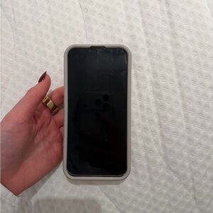 iPhone 14 Sleek Black Smartphone with White Case